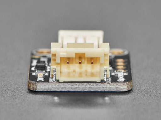 Video of a blue plastic propeller fan installed on a MOSFET motor driver hooked up to a round microcontroller via alligator clips. The blue propeller fan oscillates on and off in short bursts.