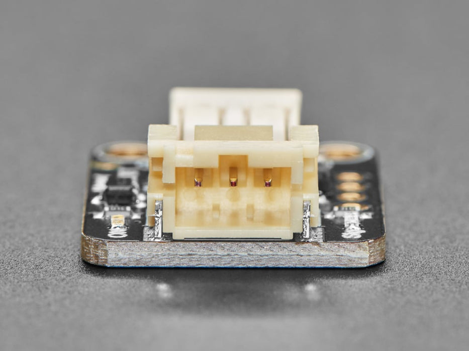 Video of a blue plastic propeller fan installed on a MOSFET motor driver hooked up to a round microcontroller via alligator clips. The blue propeller fan oscillates on and off in short bursts.