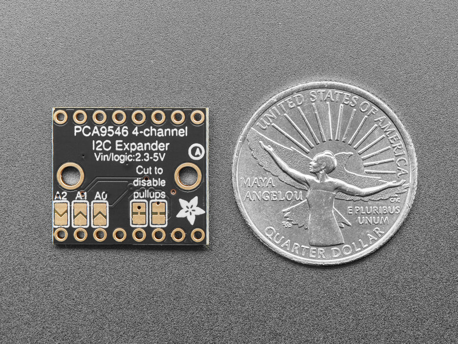 Angled shot of small, black, square I2C multiplexer.