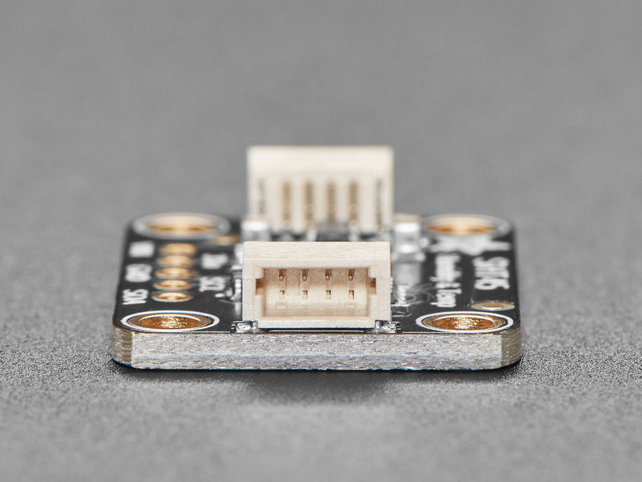 Angled shot of black rectangular temperature-humidity sensor breakout.