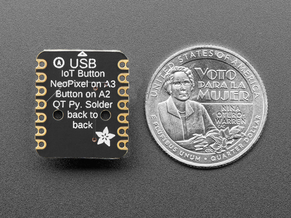 Angled shot of a square-shaped breakout board with an on-off button.