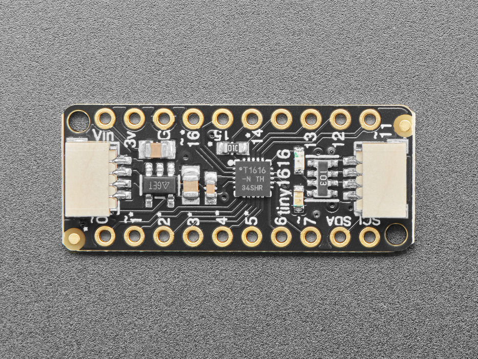 Angled shot of skinny rectangular breakout board.