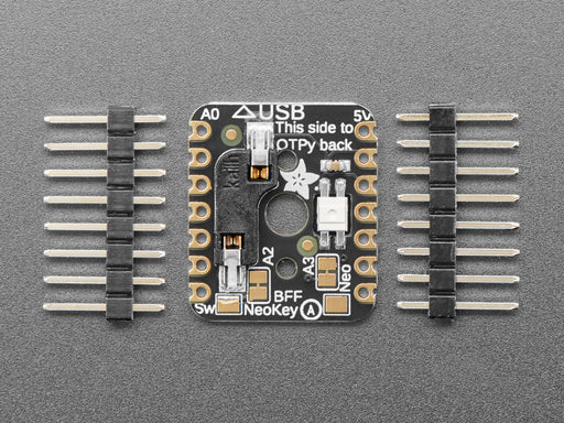 Video of a white finger pressing a mechanical key switch on a breakout board. The RGB LED emits rainbow colors whenever the finger presses the key switch.