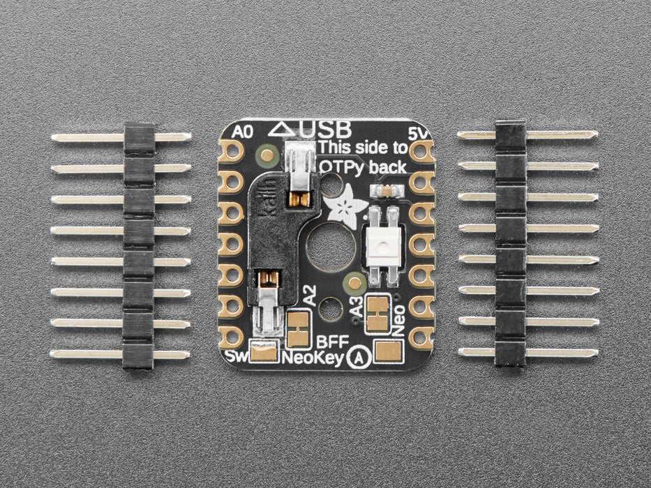 Video of a white finger pressing a mechanical key switch on a breakout board. The RGB LED emits rainbow colors whenever the finger presses the key switch.