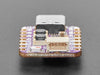 Angled shot of purple, square-shaped microcontroller.