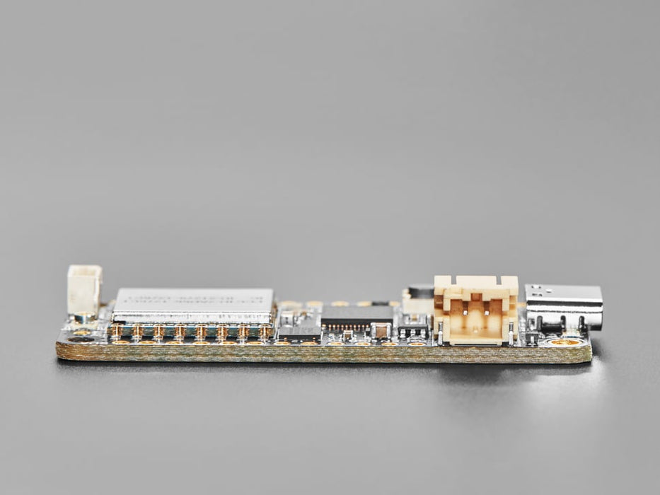 Angled shot of rectangular LoRa radio dev board.