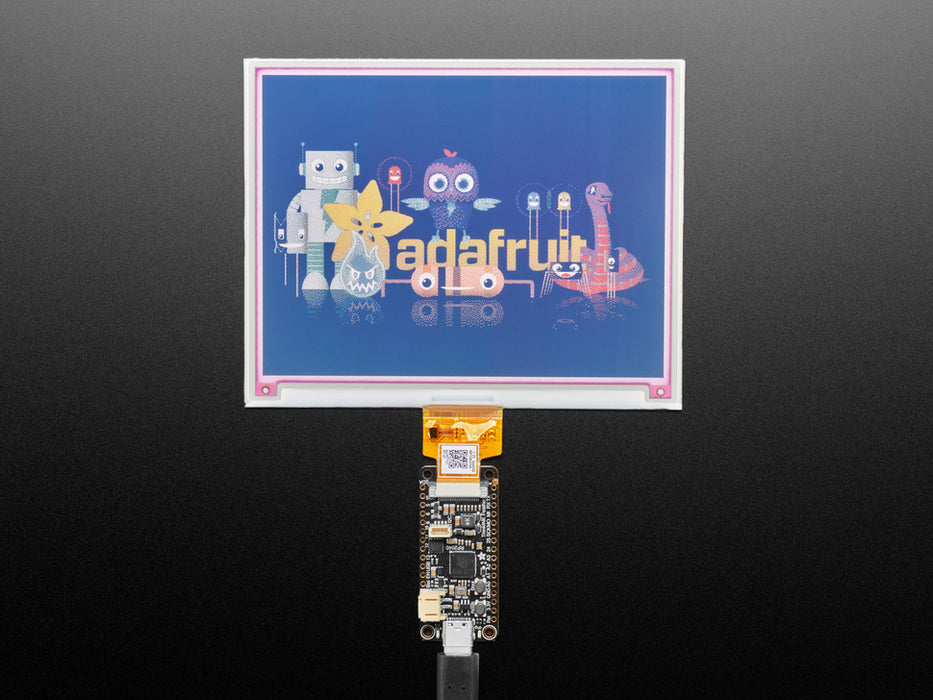 Overhead video of a rectangular microcontroller powering a big e-ink display.