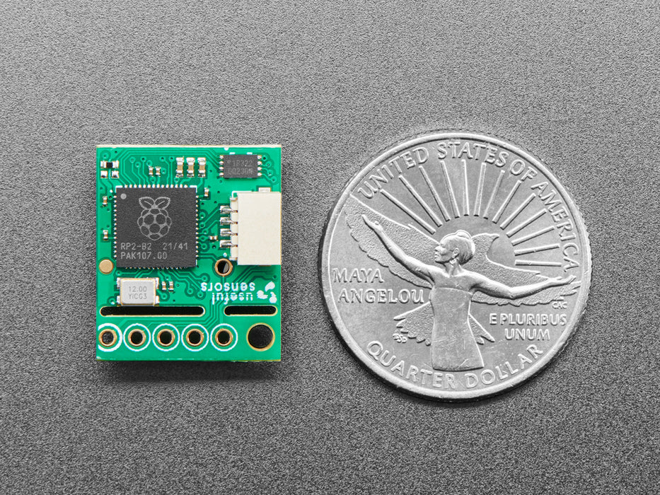 Angled shot of small green QR code reader sensor breakout.