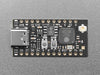 Angled shot of short rectangular black microcontroller.