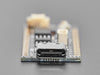 Angled shot of long skinny black microcontroller.