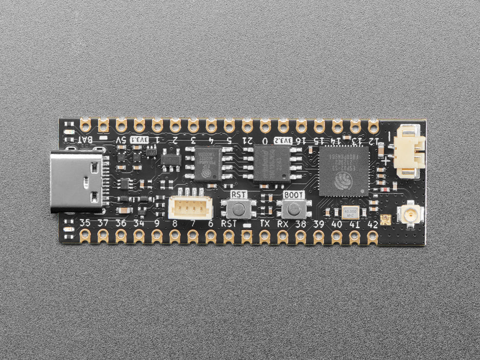 Angled shot of long skinny black microcontroller.