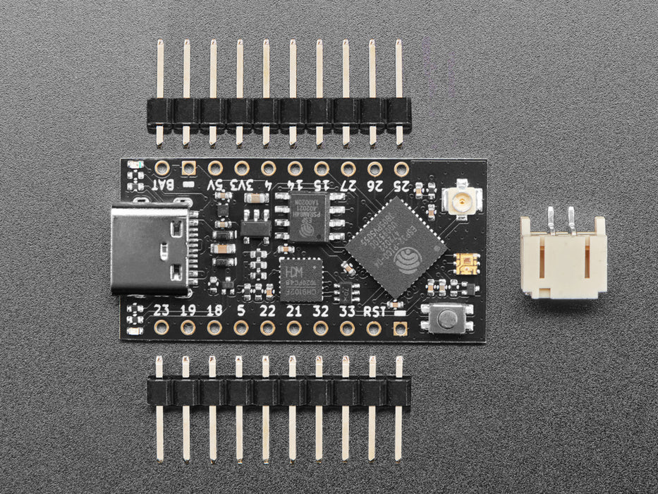 Angled shot of short black microcontroller.