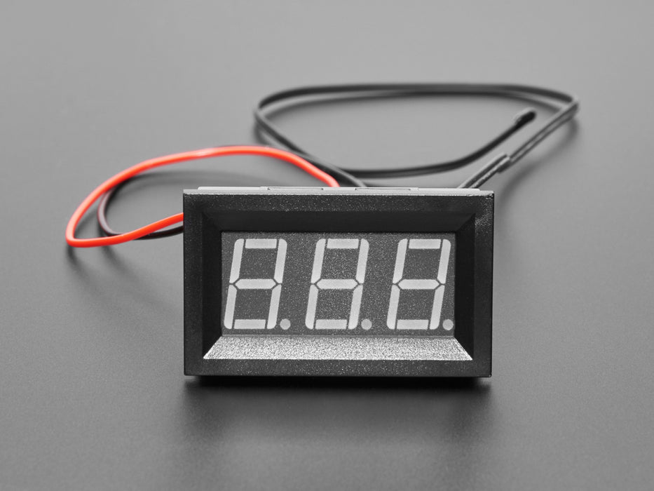 Angled shot of a Panel Tempature Meter reading 23.