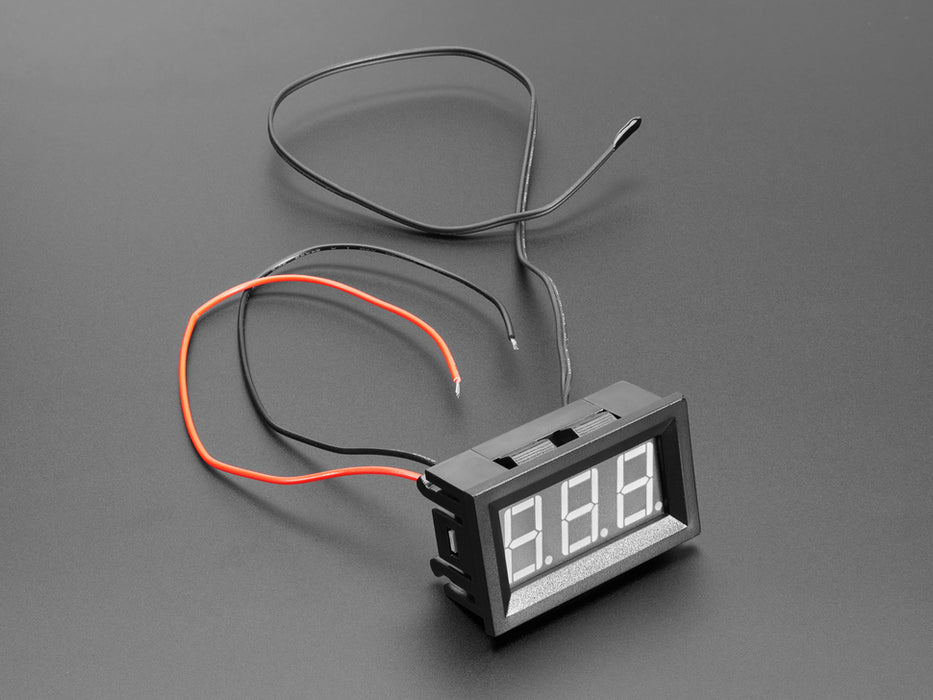 Angled shot of a Panel Tempature Meter reading 23.