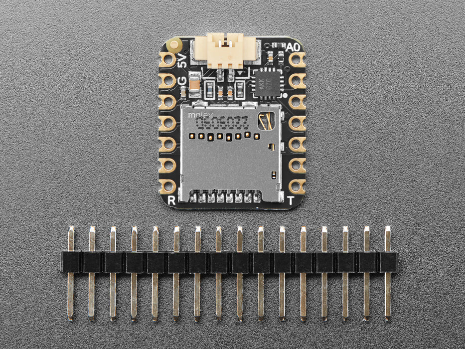 Angled shot of small square audio breakout board.