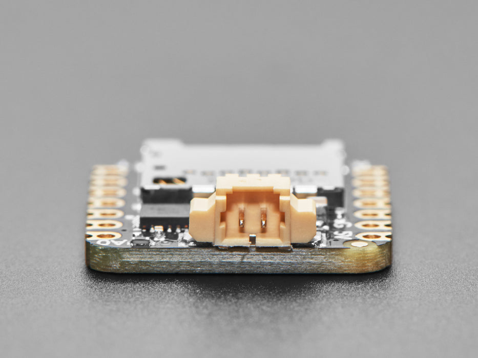 Angled shot of small square audio breakout board.