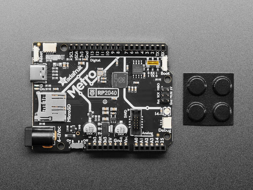 Angled shot of black, credit-card-sized development board.