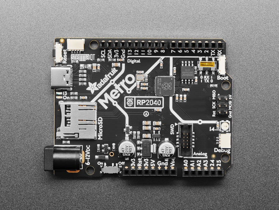 Angled shot of black, credit-card-sized development board.