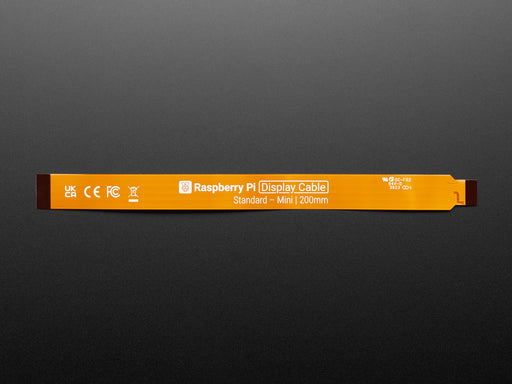 Close-up of FPC ribbon cable connecting a Raspberry Pi to a 7" touchscreen.