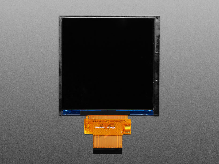 Overhead shot of a 3.4" square TFT screen connected to a microcontroller. The screen displays a colorful rainbow gradient. A white hand draws a heart on the screen.