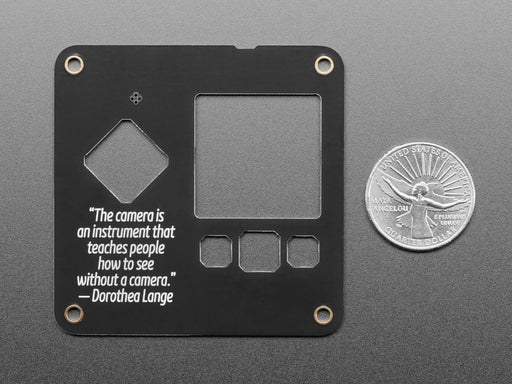 Overhead shot of two square-shaped PCB boards for a DIY camera above eight black plastic screws and four black plastic hex nuts.