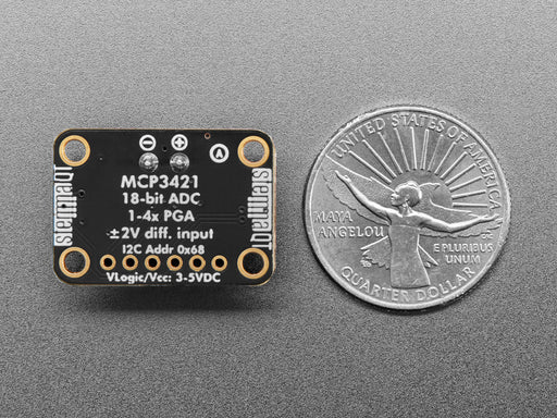 Video of a white hand squeezing a thermocouple. The digital readout is on a TFT display on a long, rectangular microcontroller.