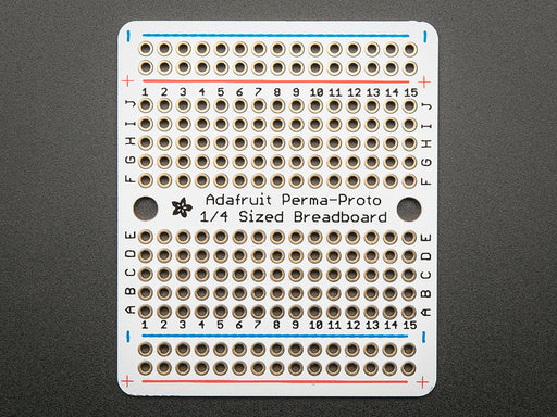 Top view of three fanned out Adafruit Perma-Proto Quarter-sized Breadboard PCBs.