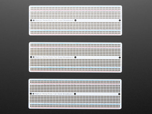 Angled shot of Adafruit Perma-Proto Full-sized Breadboard PCB.