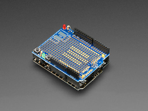 Adafruit Metro 328 Starter Pack showing kit contents, with boards, PCBs, wires and power supplies