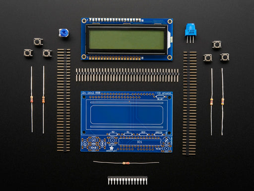 RGB LCD Shield Kit w/ 16x2 Character Display. Display backlight blue and reads "Adafruit RGB LCD Shield w/Keypad!"