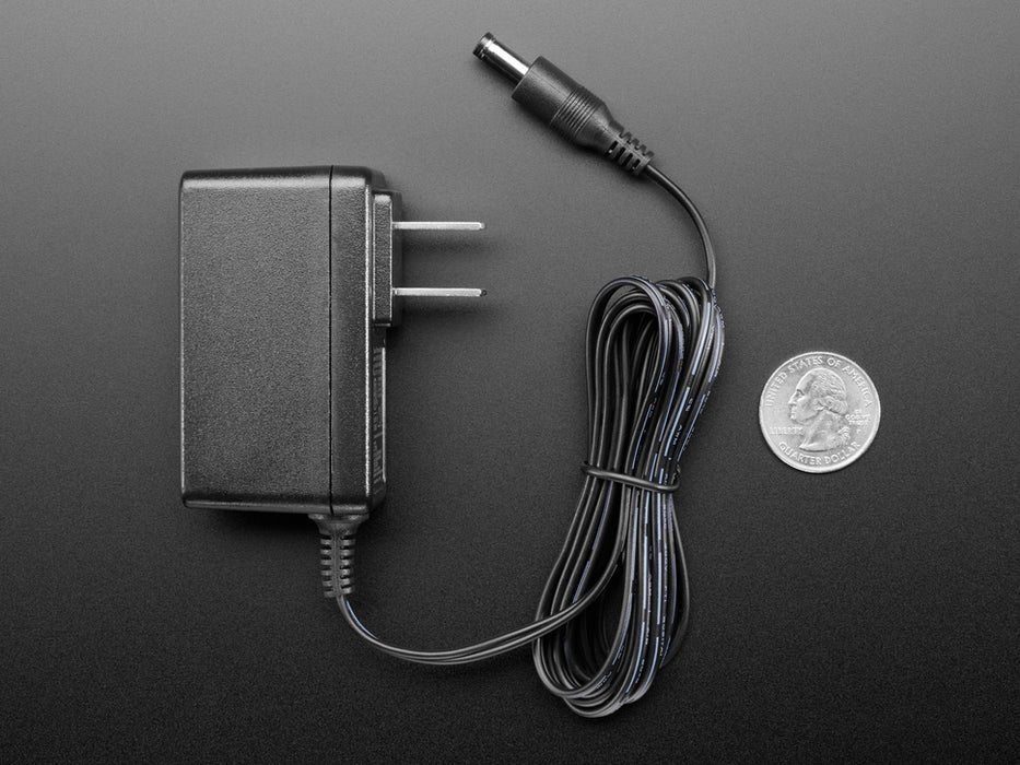 Wall wart power supply with 2.1mm DC output.