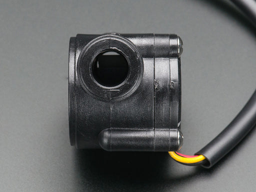 Liquid Flow Meter with two threaded inlets, and two-pin wire coming out