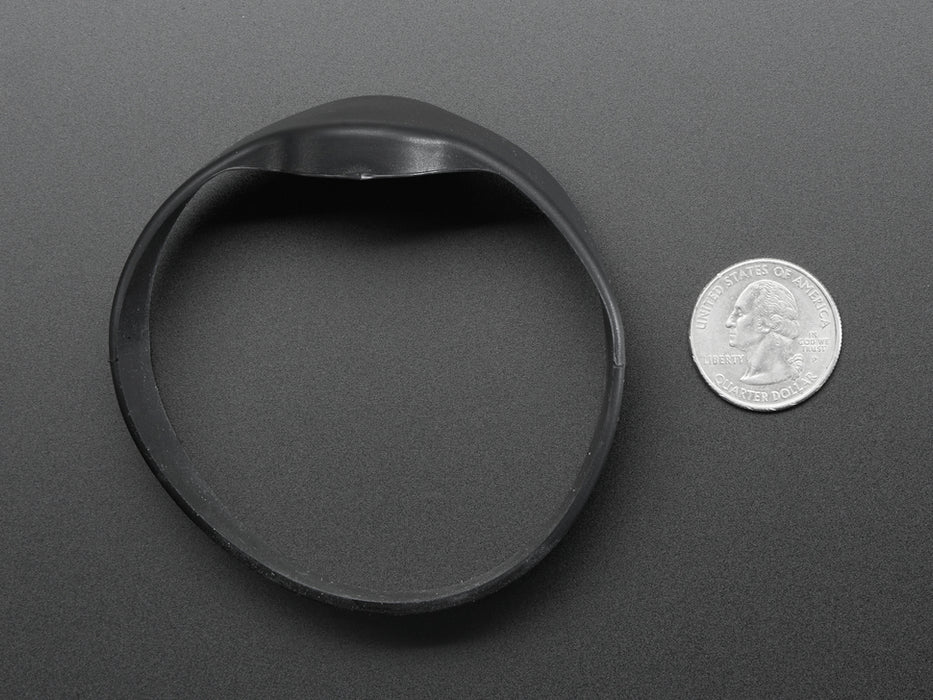 Rubber bracelet with round disc inside